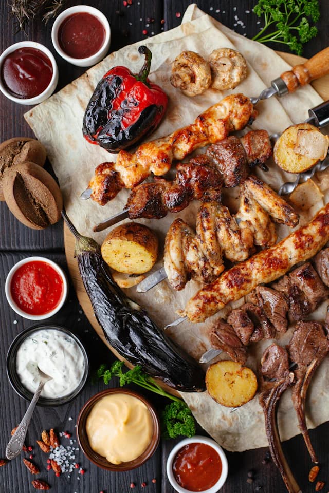 Grilled chicken served with roasted vegetables — illustrative stock photograph